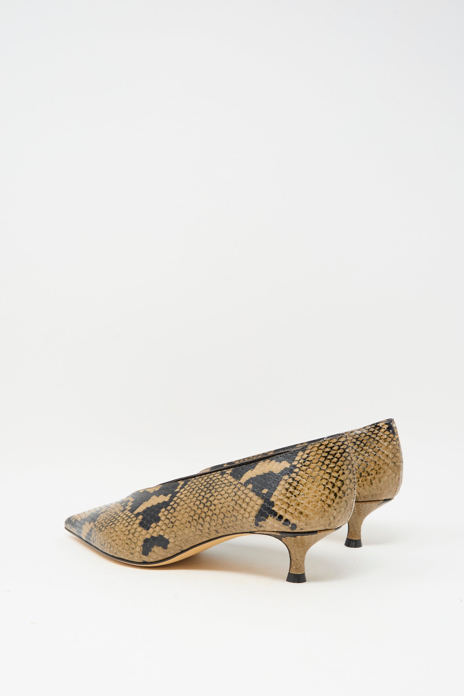 The Babouche Kitten Heel in Fango by Le Monde Beryl features low heels and pointed toes, crafted from brown and black snake-embossed leather, and is displayed on a white background.