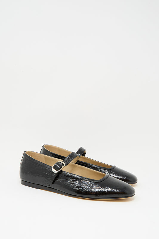 The Ballet Mary Jane in Black by Le Monde Beryl features black lambskin leather, a buckled strap, and is shown against a plain white background.