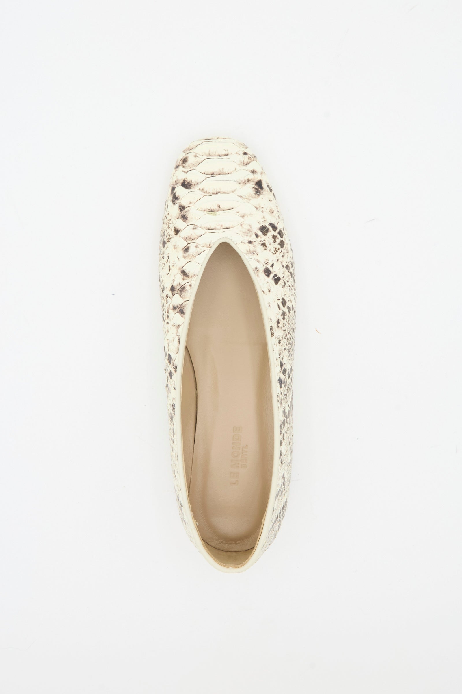 A single Classic Regency Flat in Roccia by Le Monde Beryl, featuring cream-hued snake-embossed leather, is photographed from above on a white background.