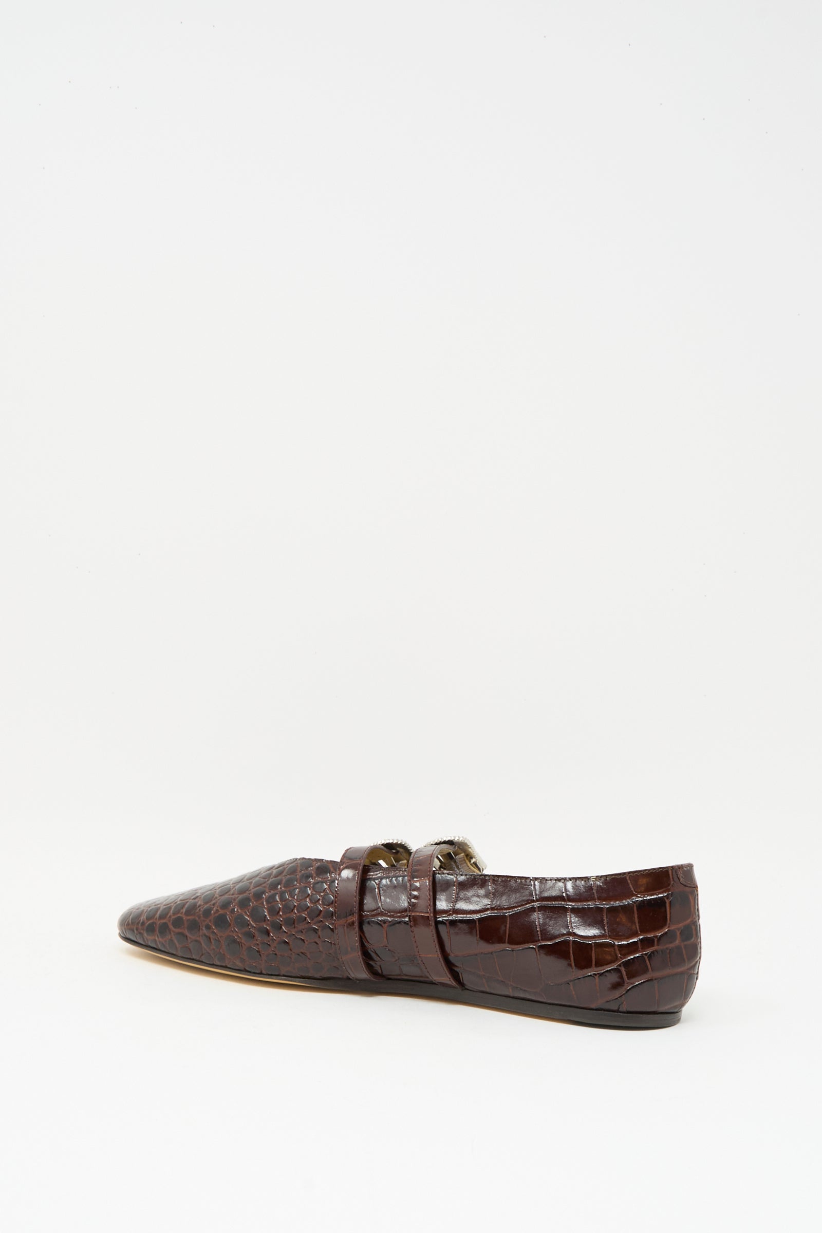 The Claudia Slipper in Coco Brown by Le Monde Beryl, crafted from crocodile-patterned calf leather with a pointed toe, appears against a plain white background.