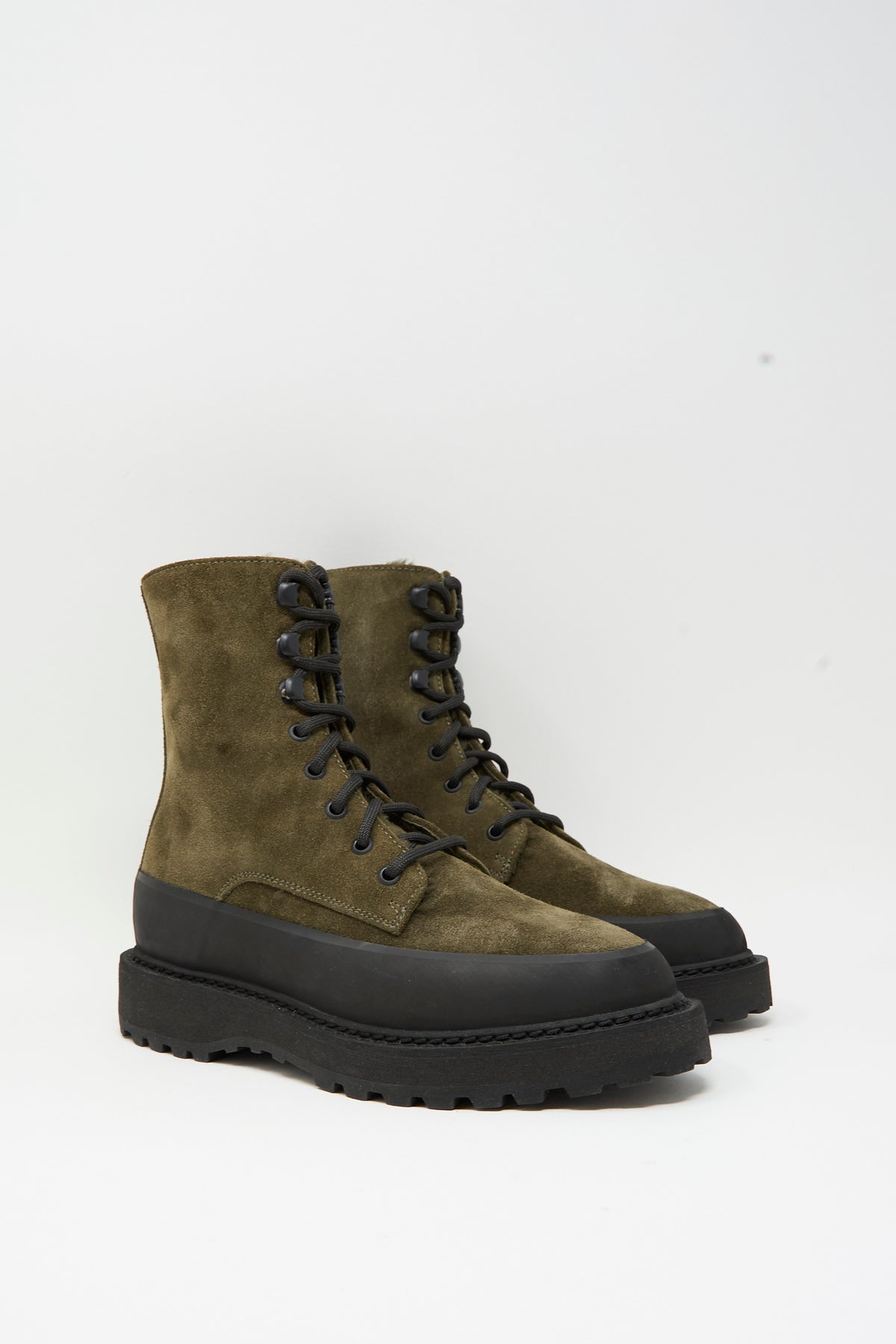 Le Monde Beryl Dolomite Boot in Military: olive green suede ankle boots with a black rubber mudguard and a chunky, lugged sole.