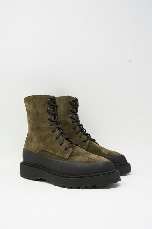 Le Monde Beryl Dolomite Boot in Military: olive green suede ankle boots with a black rubber mudguard and a chunky, lugged sole.