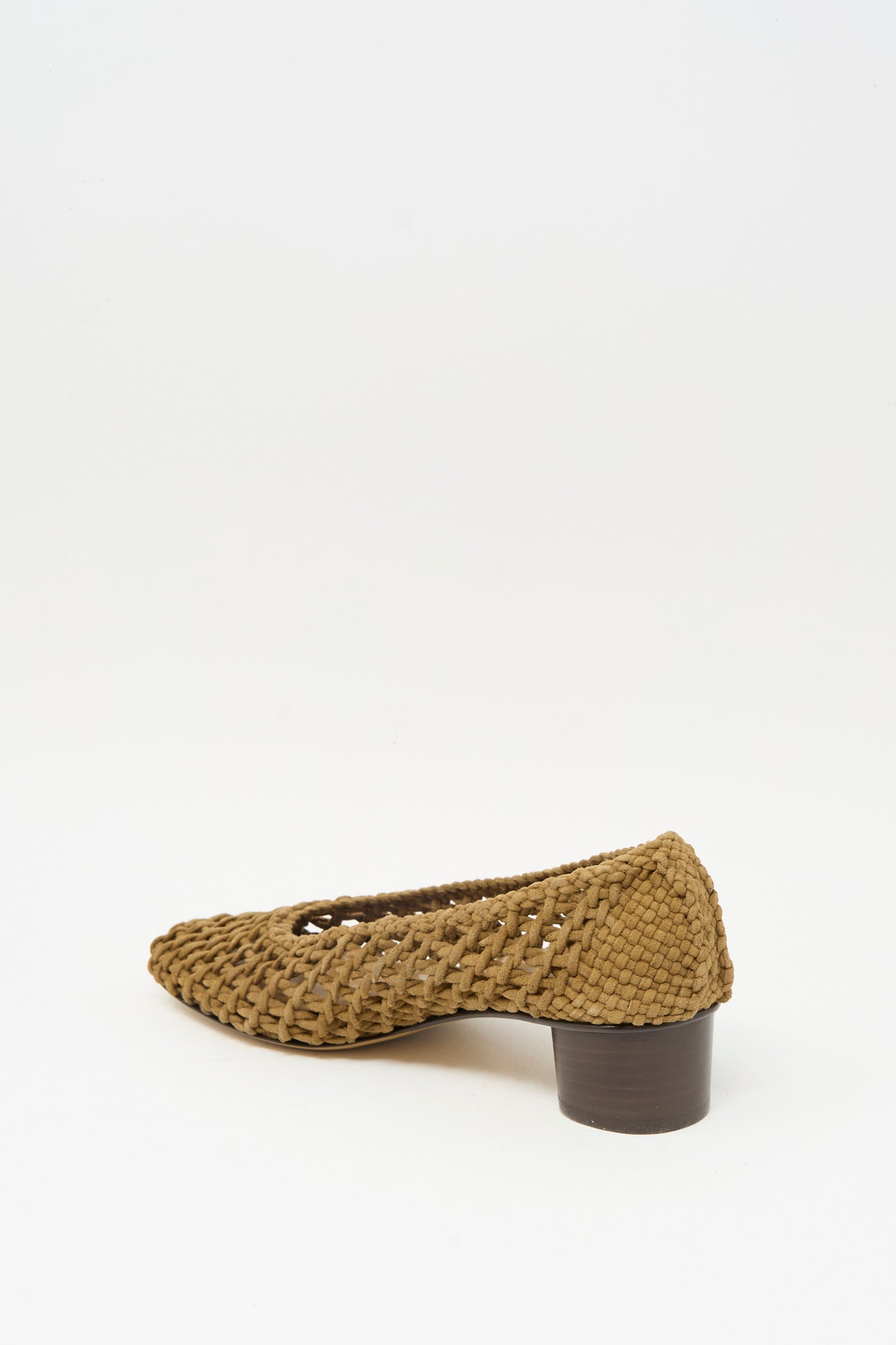 The Le Monde Beryl Knotted Ballet Pump in Taupe, featuring woven suede and a low block heel, is displayed at an angle to show its side and back against a plain white background.
