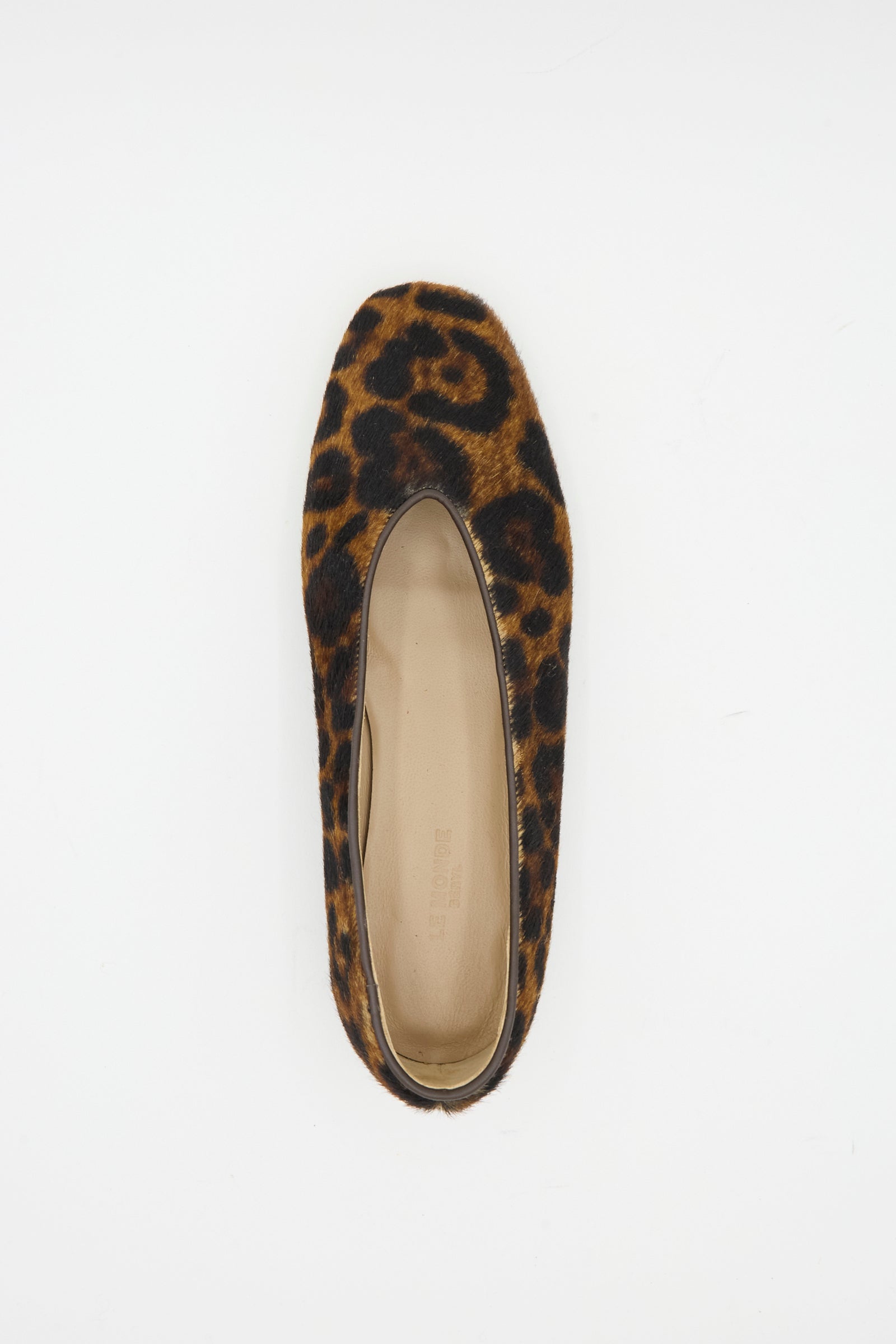 The Regency Slipper in Leopard by Le Monde Beryl is a single calf hair slipper with a square toe and leopard print, made in Italy and shown from above on a white background.