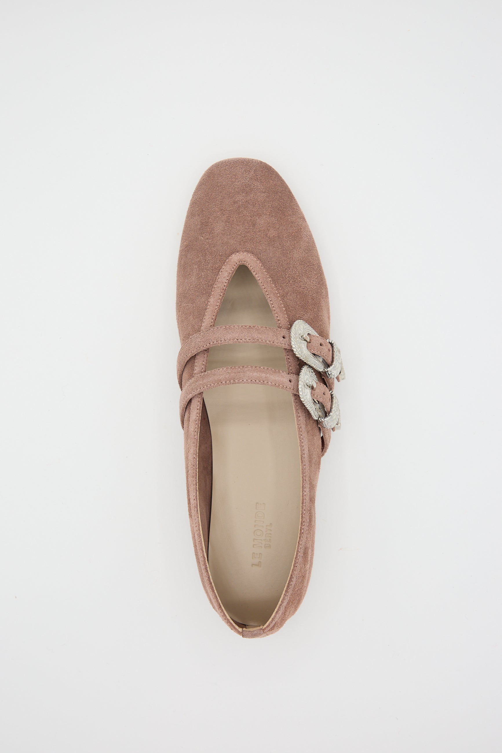 A lone pink suede ballet slipper from Le Monde Beryl, known as the Suede Ballet Claudia Slipper, showcases two thin straps and silver buckles against a plain white background.