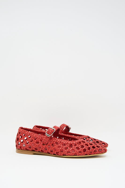 The Le Monde Beryl Woven Leather Mary Jane in Crimson Red is a single flat shoe with a buckle strap, handwoven leather construction, and cushioned insole, shown against a plain white background.