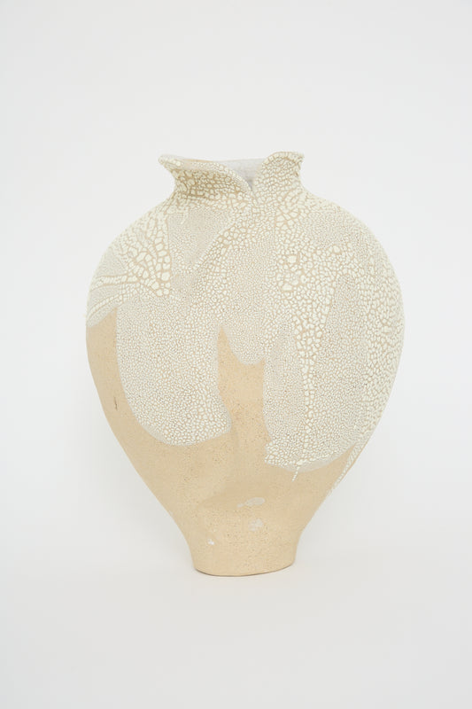 Vessel No. 741 in White Sculpture Clay with intricate lace-like patterns on a plain background by Lost Quarry.
