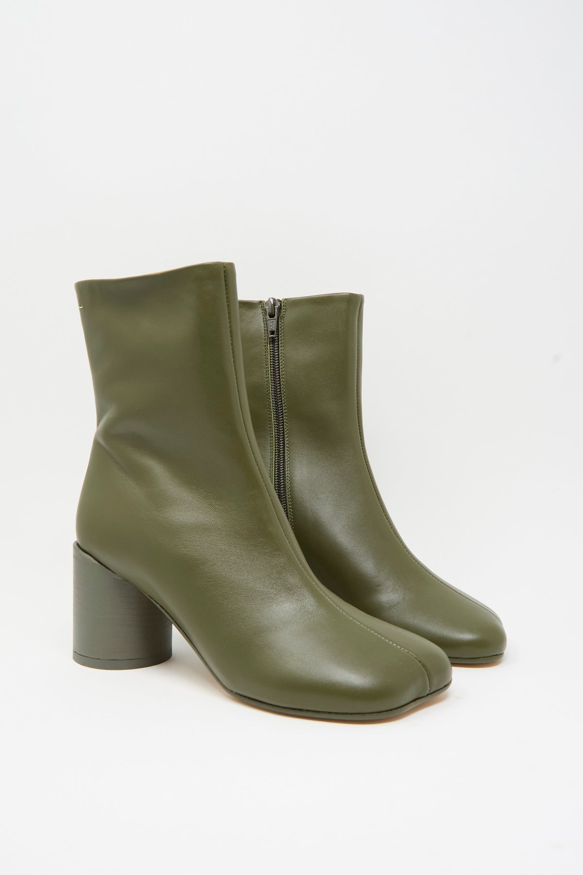 MM6 Ankle Boot in Beech: olive green calfskin ankle-high boots with a square toe, side zipper, and block heel.