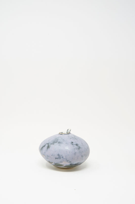 The MONDAYS Mini Moon Vase in Blue features a round, smooth, marbled grayish surface and sits on a white background, evoking the artisanal charm of Upstate NY pottery.