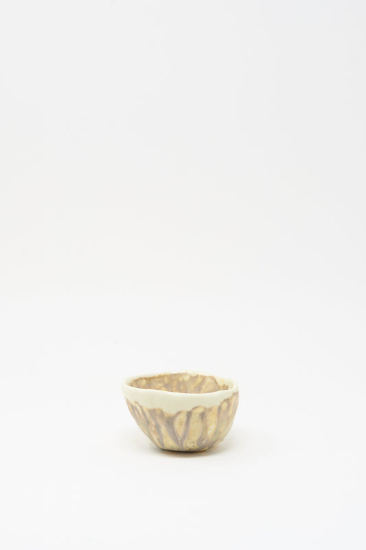 The Soda-Fired Pinched Bowl II by MONDAYS is a small handmade bowl with a cream and brown glaze, crafted in Upstate NY pottery style, shown on a plain white background.