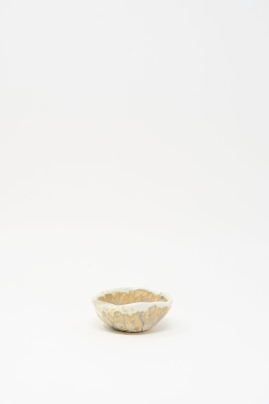 The MONDAYS Soda-Fired Pinched Bowl III is a small, round handmade bowl with a marbled beige and white design, crafted in Upstate NY pottery and photographed on a plain white background.