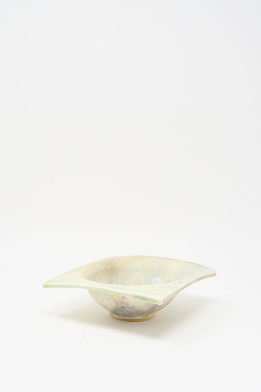 The MONDAYS Soda-Fired Porcelain Square Bambi Bowl features a shallow, handmade design with a wavy rim, light blue glaze, and subtle marbled pattern, shown against a plain white background.