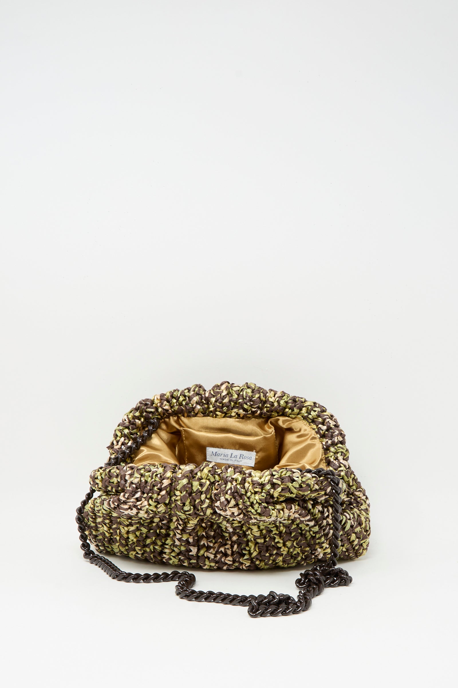 The Earth Game Crochet Bag in Natural by Maria La Rosa, with a chain strap and visible brand label, is elegantly displayed open to reveal its golden satin interior against a plain white background.
