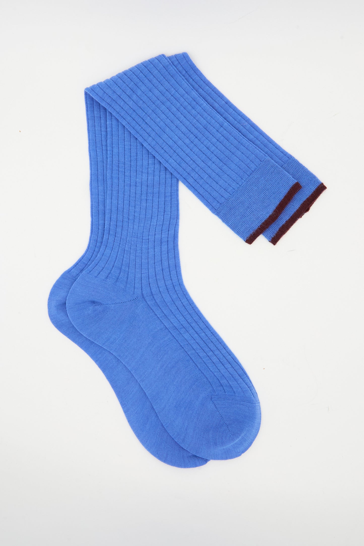 The Maria La Rosa Long Sock in Aviatore: ribbed blue cotton socks with dark cuff trim, made in Italy and shown flat on a white background.