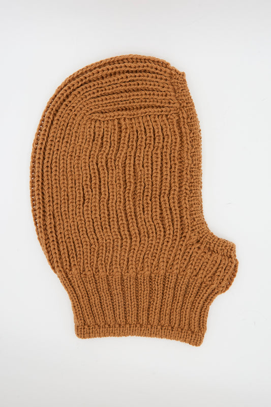 The Wool Balaclava Lina in Rust by Maria La Rosa, a handmade brown rib knit piece from Italy, is displayed flat on a white background.
