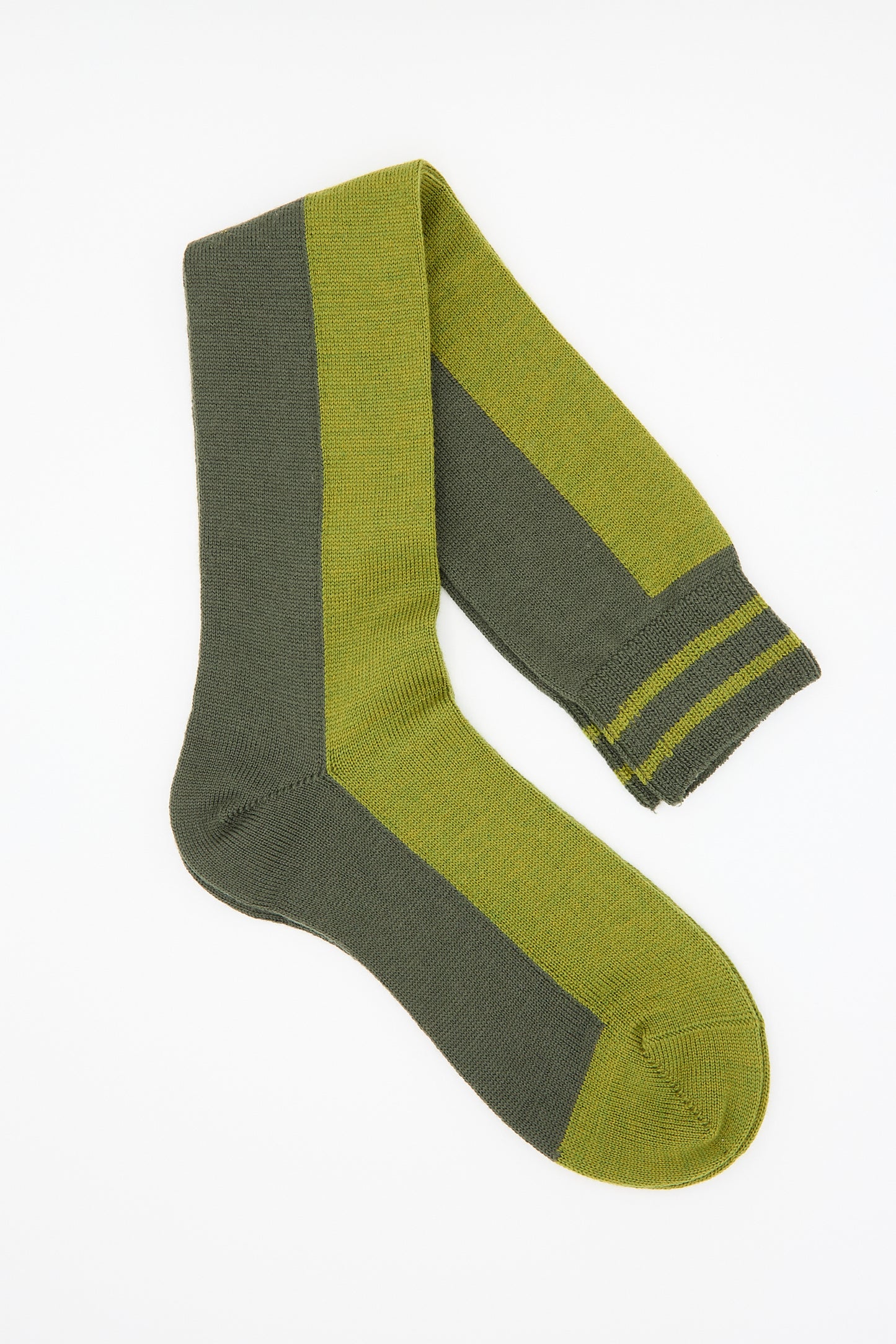 A pair of khaki-colored Long Sock by Maria La Rosa, made from a wool blend with vertical stripes near the cuff, laid flat against a white background.