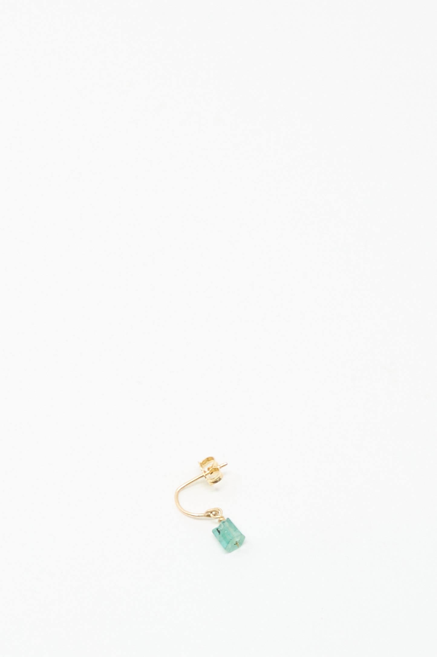 The Mary MacGill 14K Crescent Charm Single Earring features a handmade rectangular faceted green emerald pendant, shown against a plain white background.
