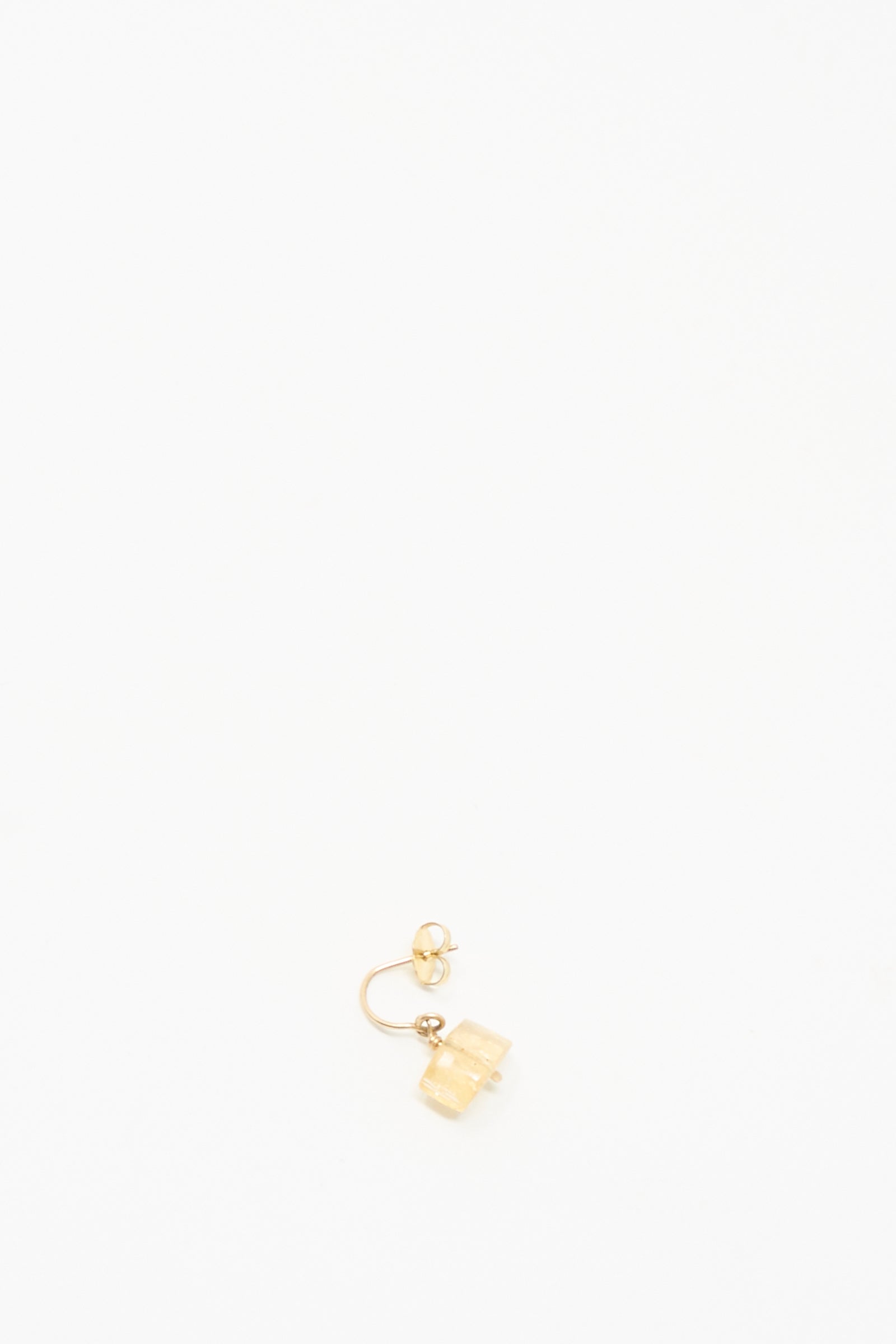 The Mary MacGill 14K Crescent Charm Earring in Imperial Topaz features a single light-hued rectangular charm and is shown on a simple white background.