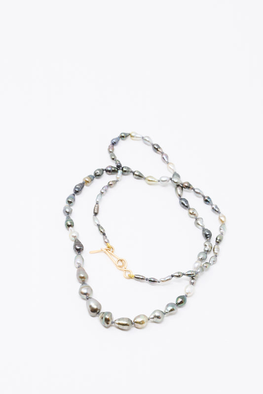 The Mary MacGill 14K Stone Layering Necklace in Keshi Pearl features irregular, multicolored Keshi pearls and a 14k gold toggle clasp, shown against a white background.