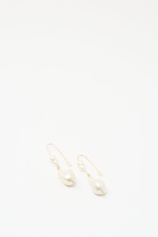 Baroque Pearl Double Drop Earrings in White by Mary MacGill feature handmade irregular and round pearls, shown on a plain white background.