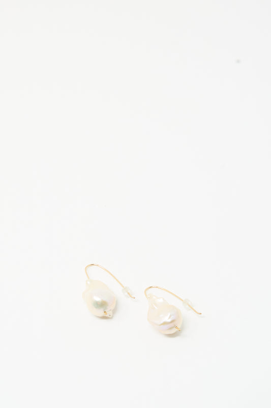 Baroque Pearl Drop Earrings in White by Mary MacGill made with gold-filled wire and unique pearls, displayed on a plain white background.