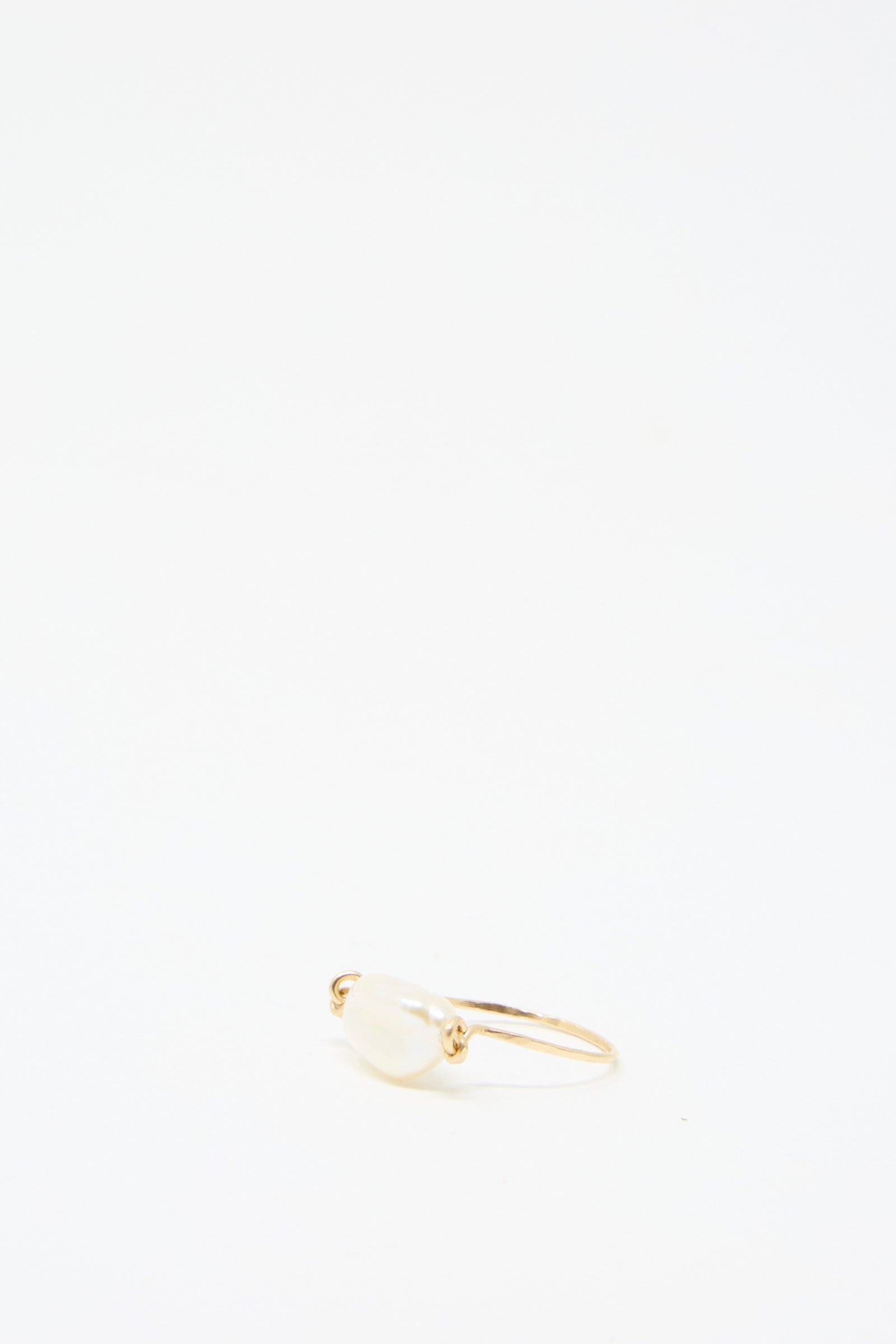 The Baroque Pearl Ring in White by Mary MacGill is elegantly displayed against a plain white background.