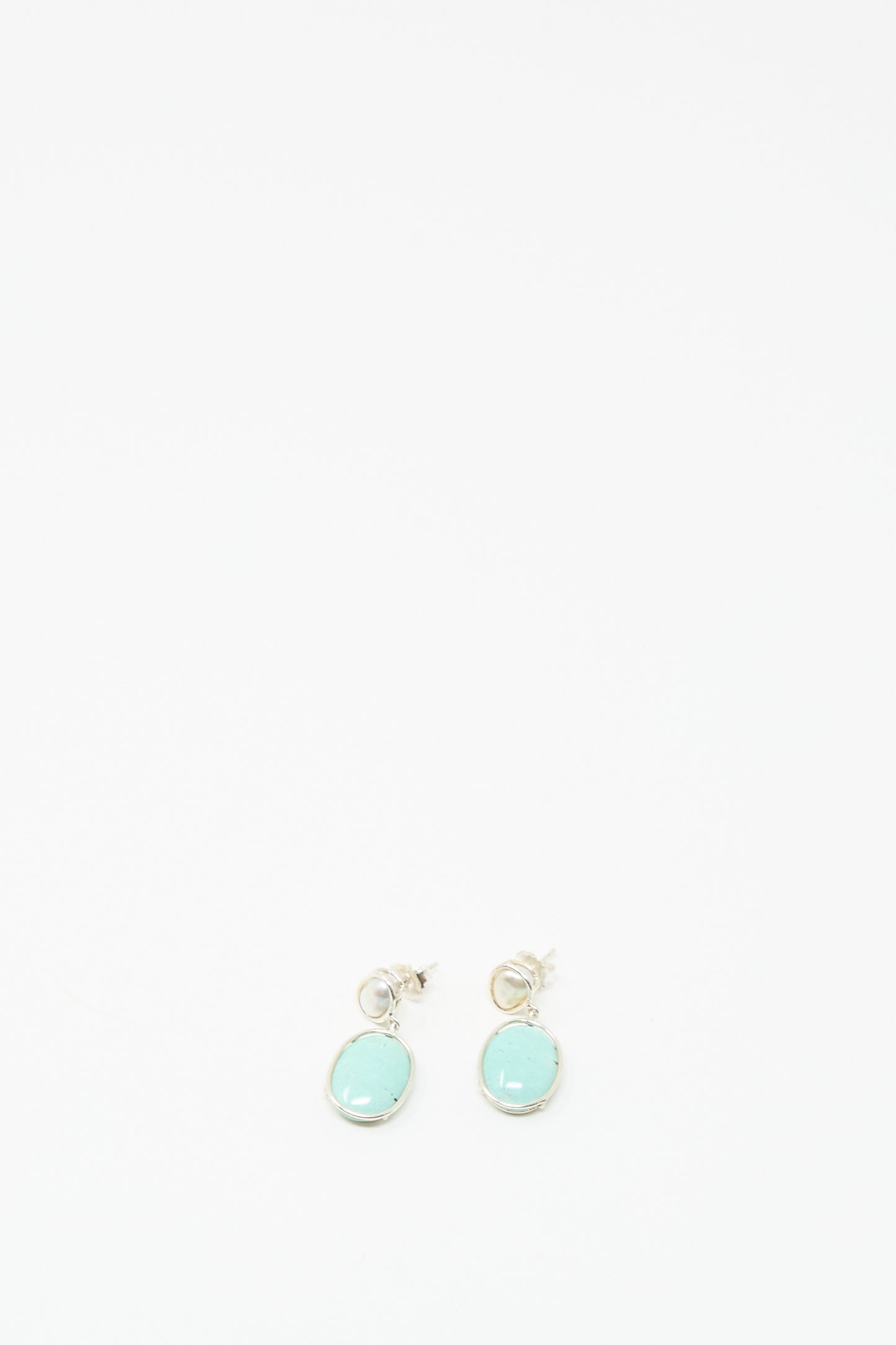 The Double Stone Drop Earrings in Keshi Pearl and Turquoise by Mary MacGill, shown on a white background, are perfect for handmade jewelry lovers.