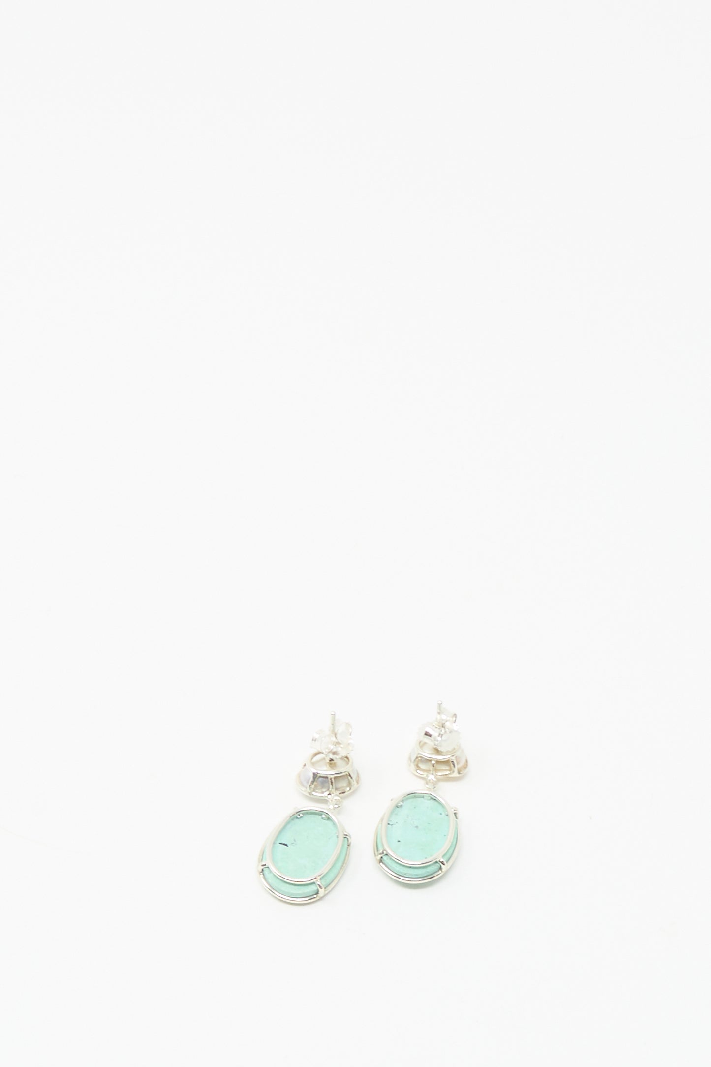 Double Stone Drop Earrings in Keshi Pearl and Turquoise by Mary MacGill feature handmade turquoise and Keshi pearl drops, set in silver, beautifully displayed on a plain white background.