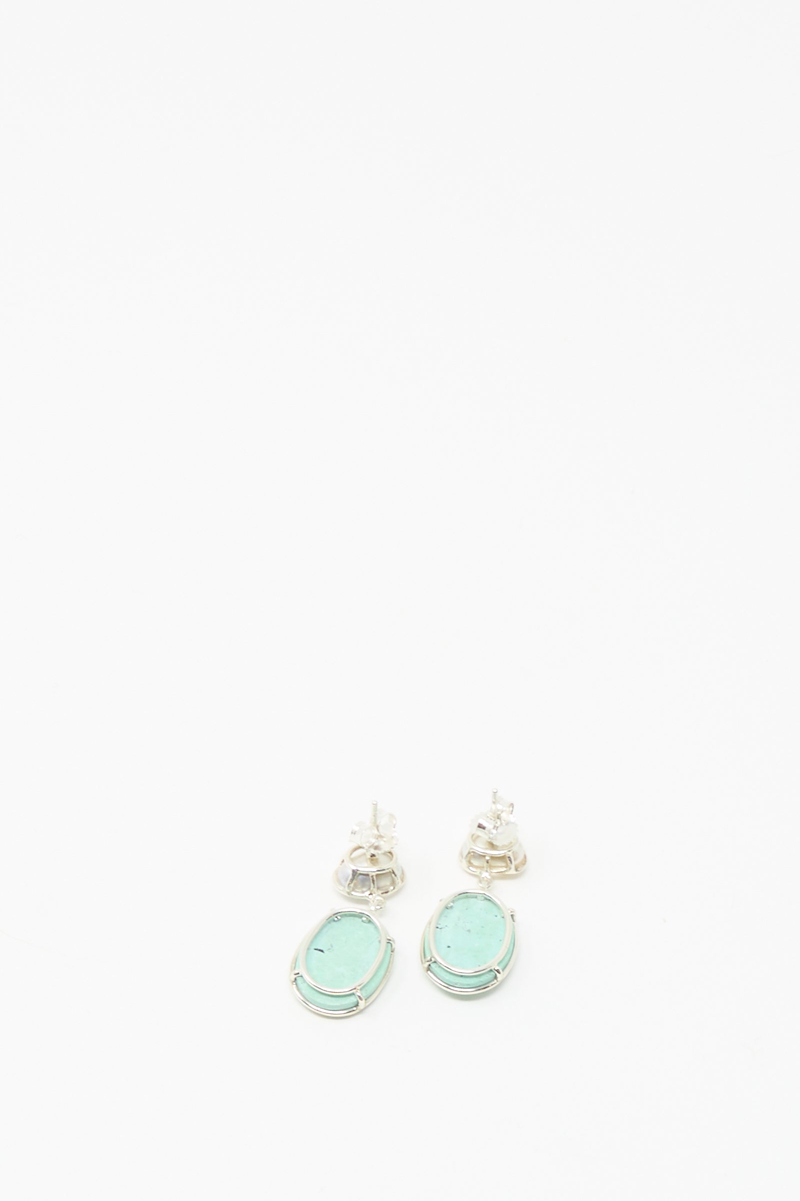 Double Stone Drop Earrings in Keshi Pearl and Turquoise by Mary MacGill feature handmade turquoise and Keshi pearl drops, set in silver, beautifully displayed on a plain white background.
