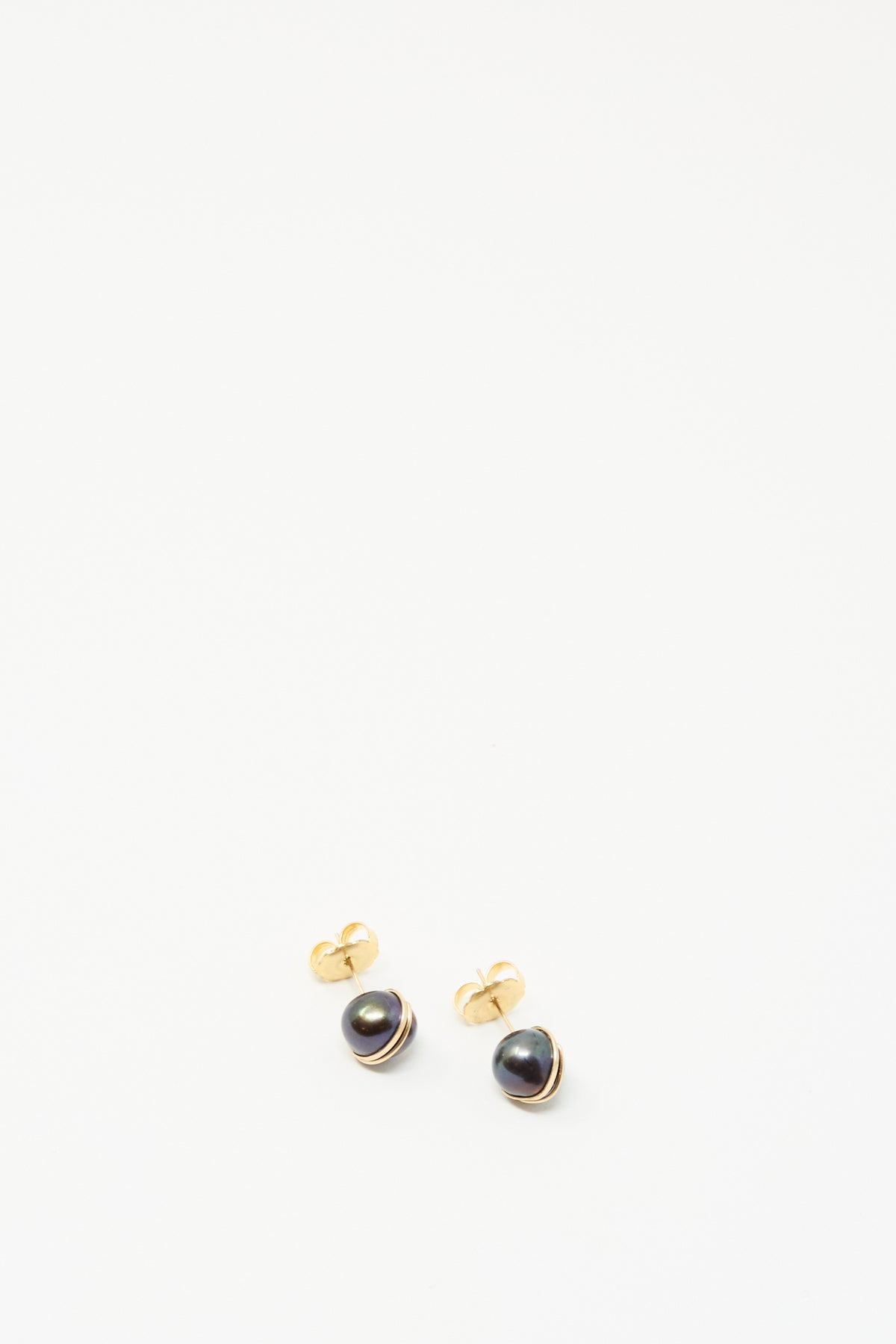 Mary MacGill Grande Baroque Pearl Studs in Charcoal, gold-filled with dark round stones, shown on a plain white background.