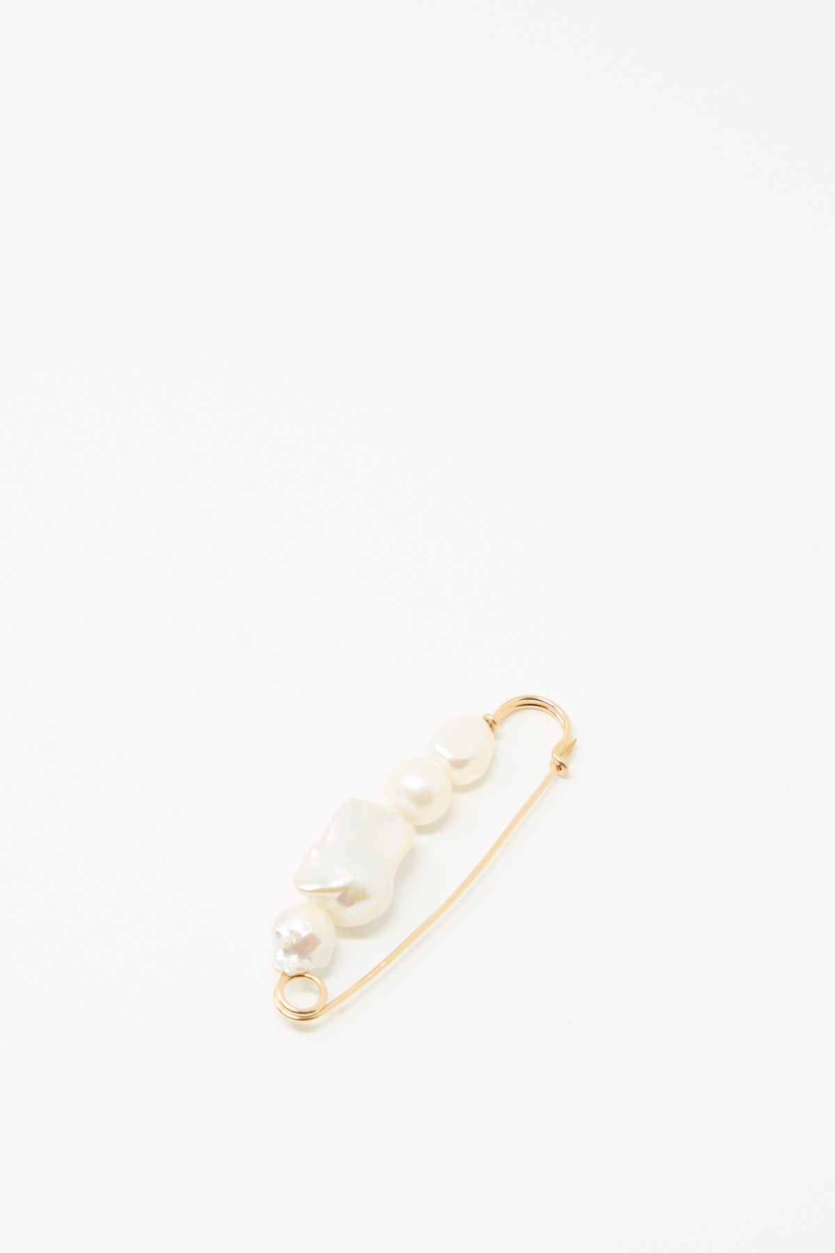 The Mary MacGill Quatro Pearl Pin features four irregular Baroque pearls on a handmade gold pin, shown against a plain white background.