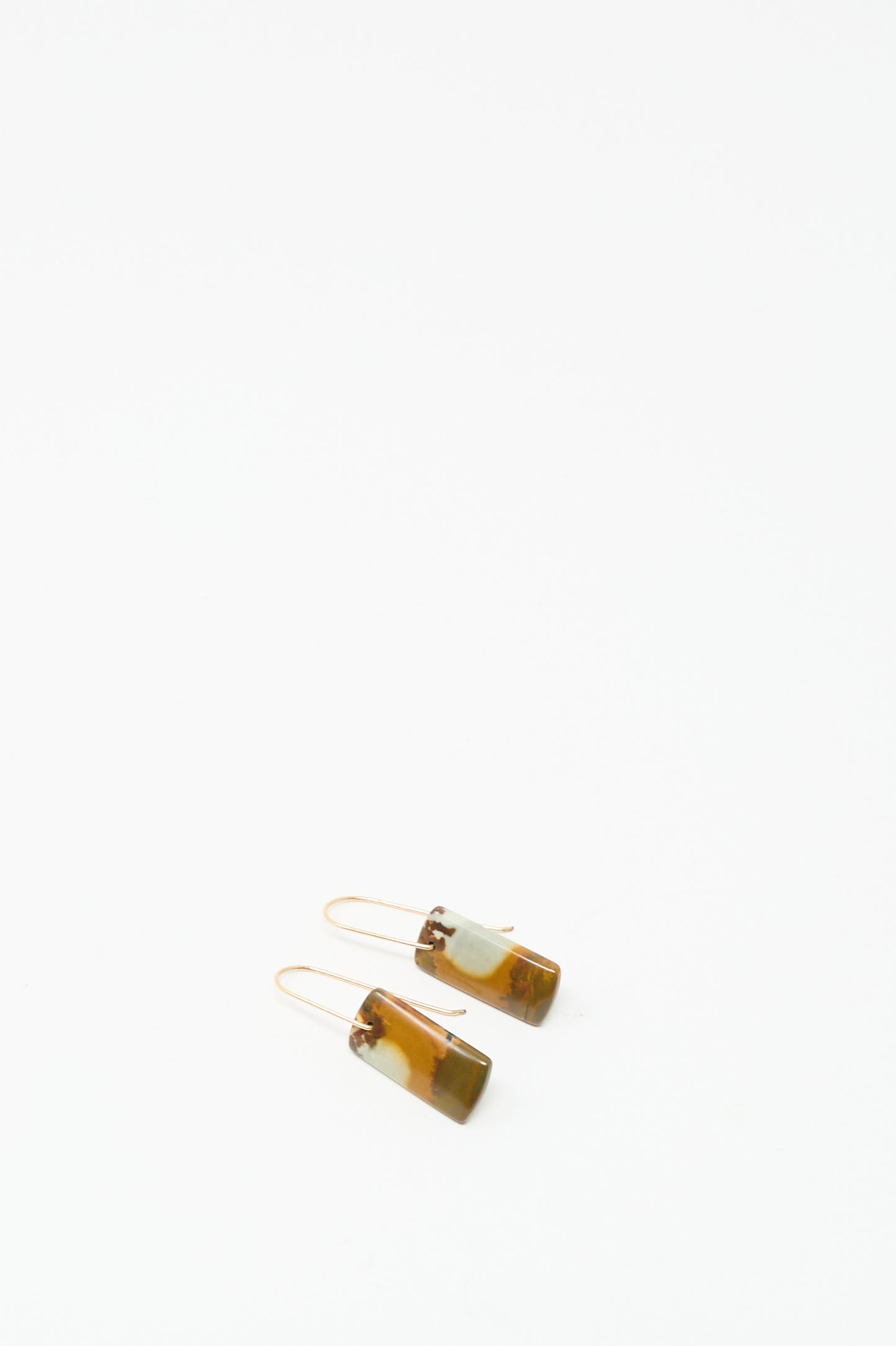 A pair of handmade Stone Drop Earrings in blue brown agate stone by Mary MacGill, featuring rectangular shapes and 14k gold-filled hooks, displayed against a plain white background.
