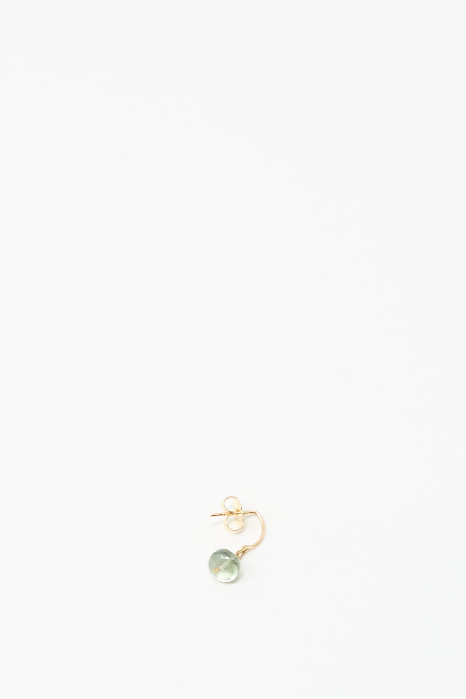 The Mary MacGill 14K Crescent Charm Earring features a round pale tourmaline and rests on a plain white background.