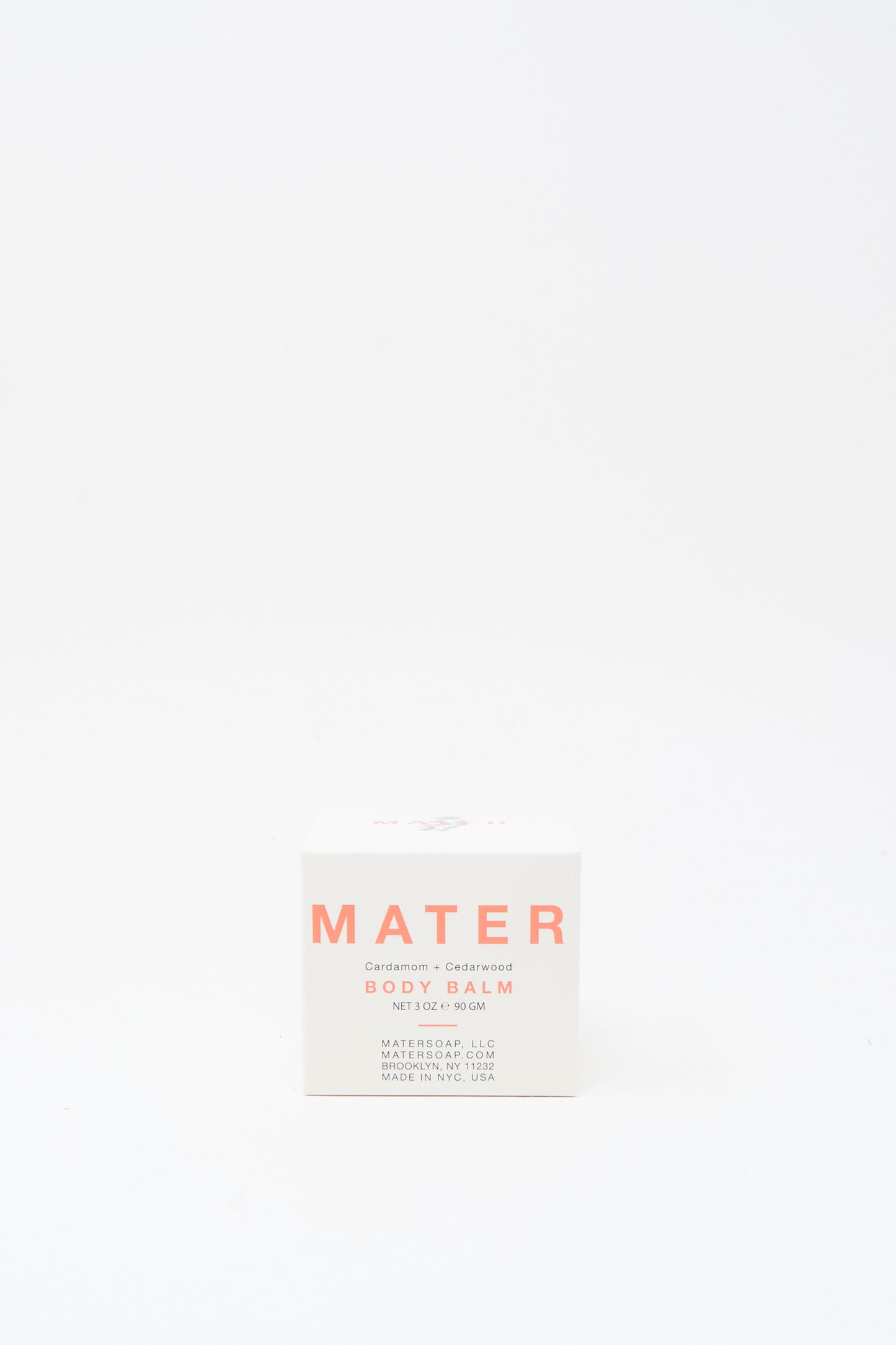 A white box of Mater Soap Cardamom and Cedarwood Body Balm, 3oz, is shown against a plain white background—ideal for fans of botanical skincare.