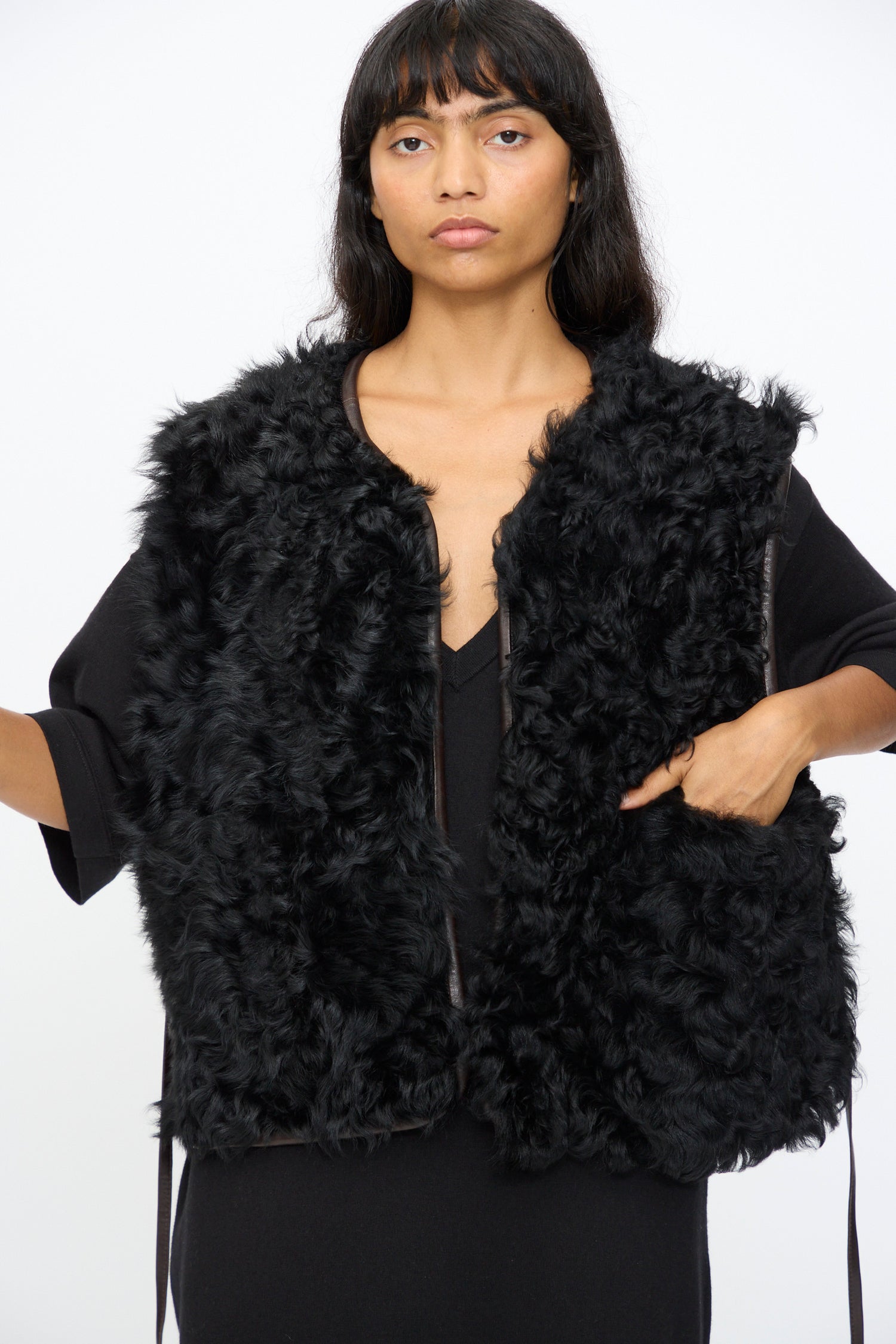 Person wearing a Transition Vest from Milena Silvano against a white background.