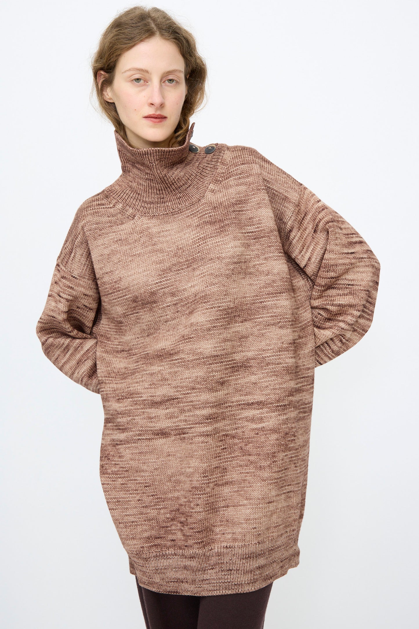 A person wearing the Misha & Puff Hutton Dress in Affogato, standing against a plain light background.