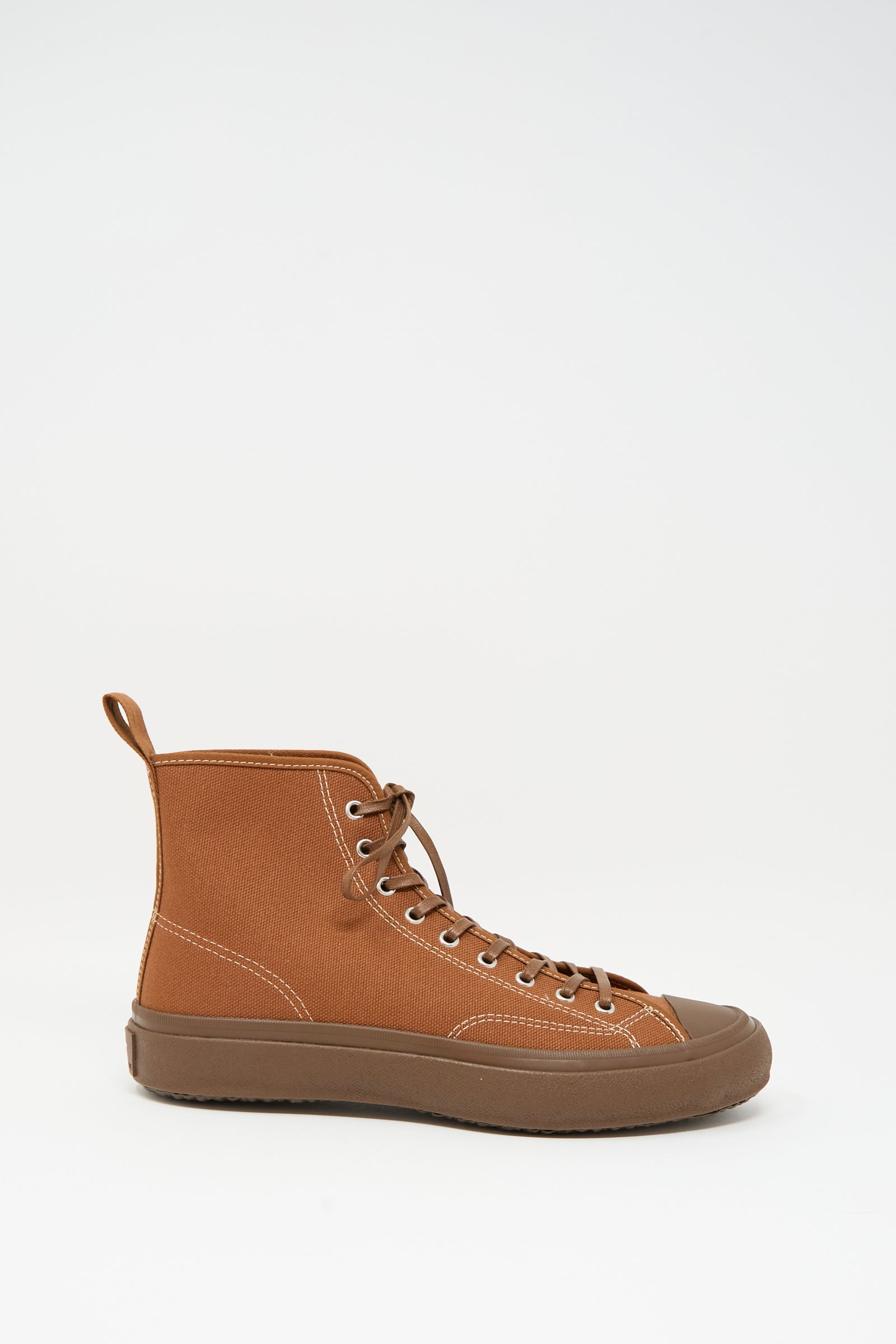 The Moonstar Hi Basket Sneaker in Brown features vintage-inspired brown canvas, white stitching, brown laces, and a sturdy brown rubber sole, shown on a plain white background.