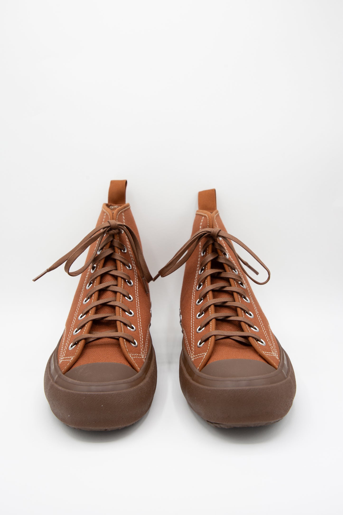 A pair of Moonstar Hibasket Sneaker in Brown with brown laces and rubber sole.