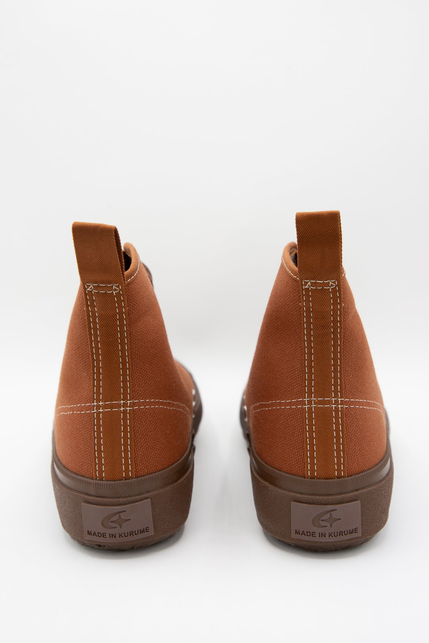 A pair of Hibasket Sneaker in Brown shoes with rubber soles, Moonstar.