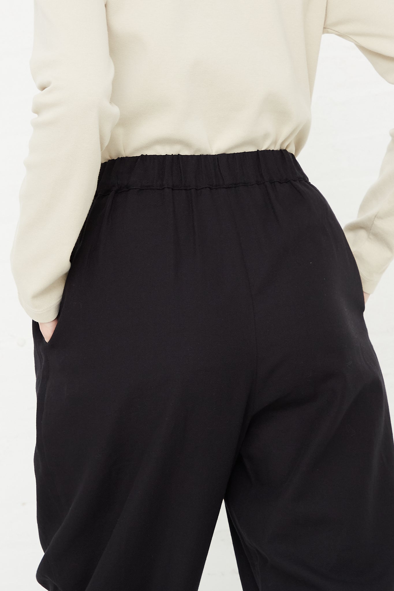 Cotton Twill Draped Pants in Black by Black Crane for Oroboro Back Upclose