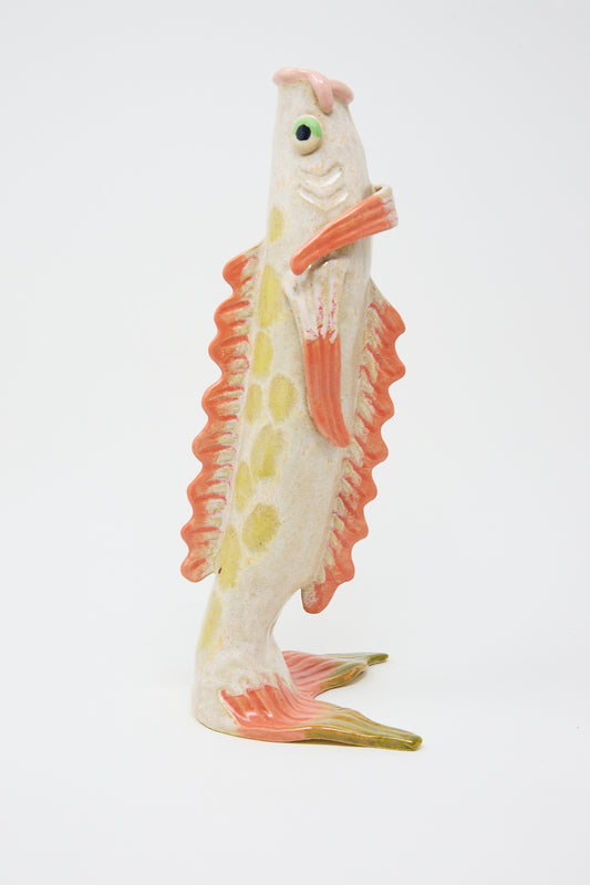 A colorful ceramic figurine of a standing koi fish with detailed scales and fins, set against a plain white background.(Product Name: Fish Vase in Pink, Brand Name: Pearce Williams)