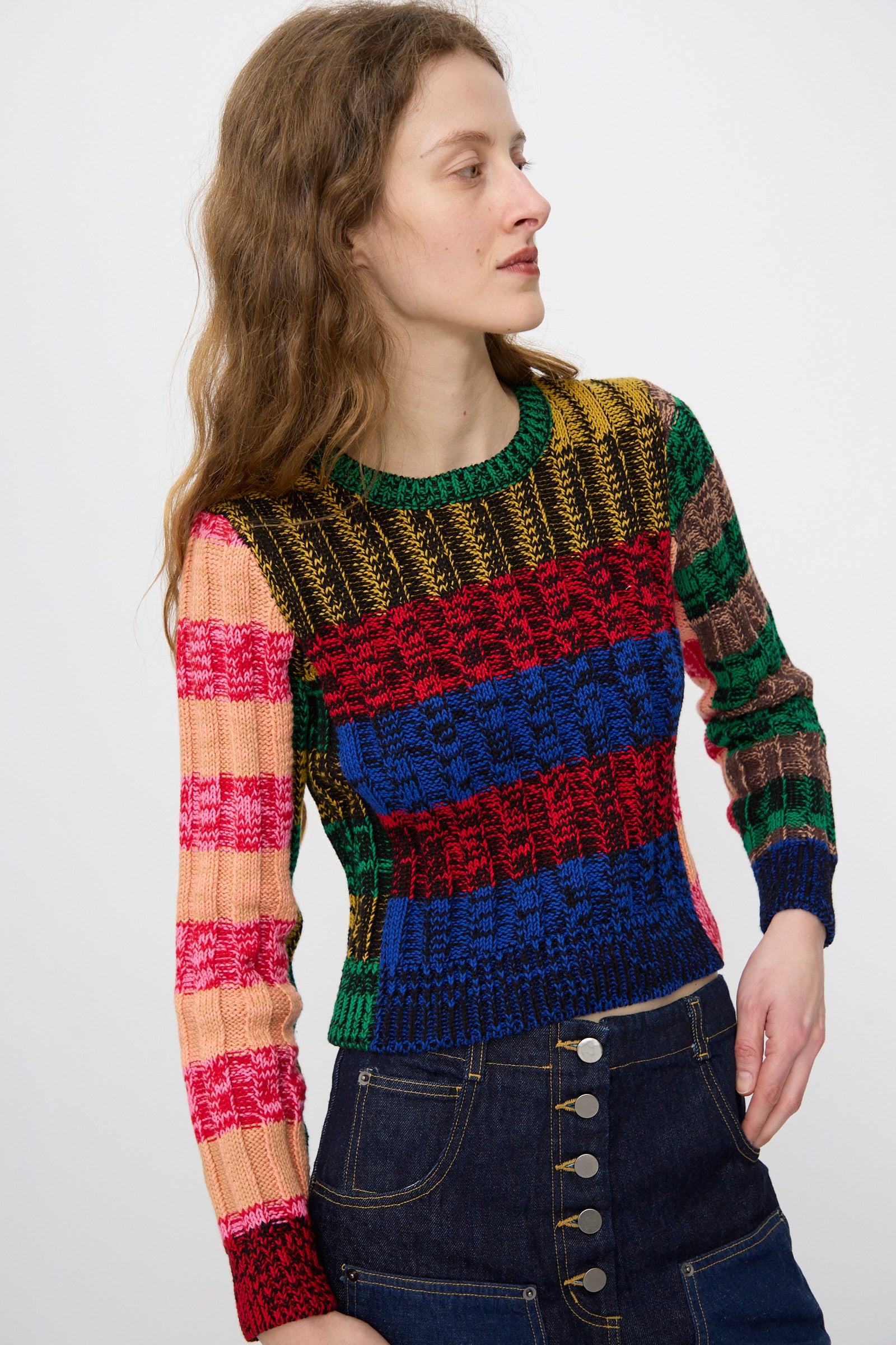 A woman wearing the Rachel Comey Muna Pullover in Stripe Multi.