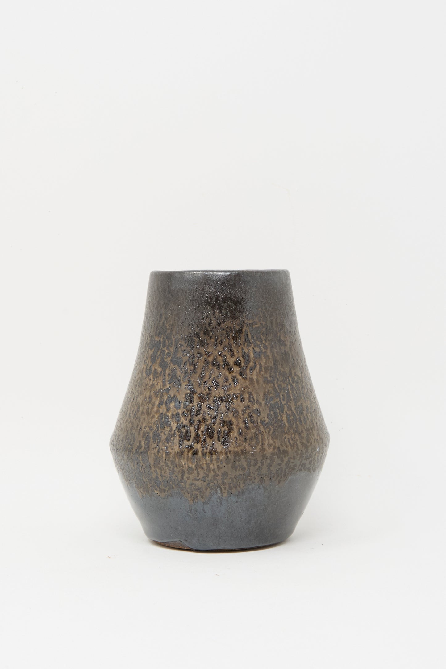 The Small Sap Vase in Black III by Rachel Craven is a handmade piece with a textured dark brown and black finish, wide base tapering to the top, displayed against a plain white background.