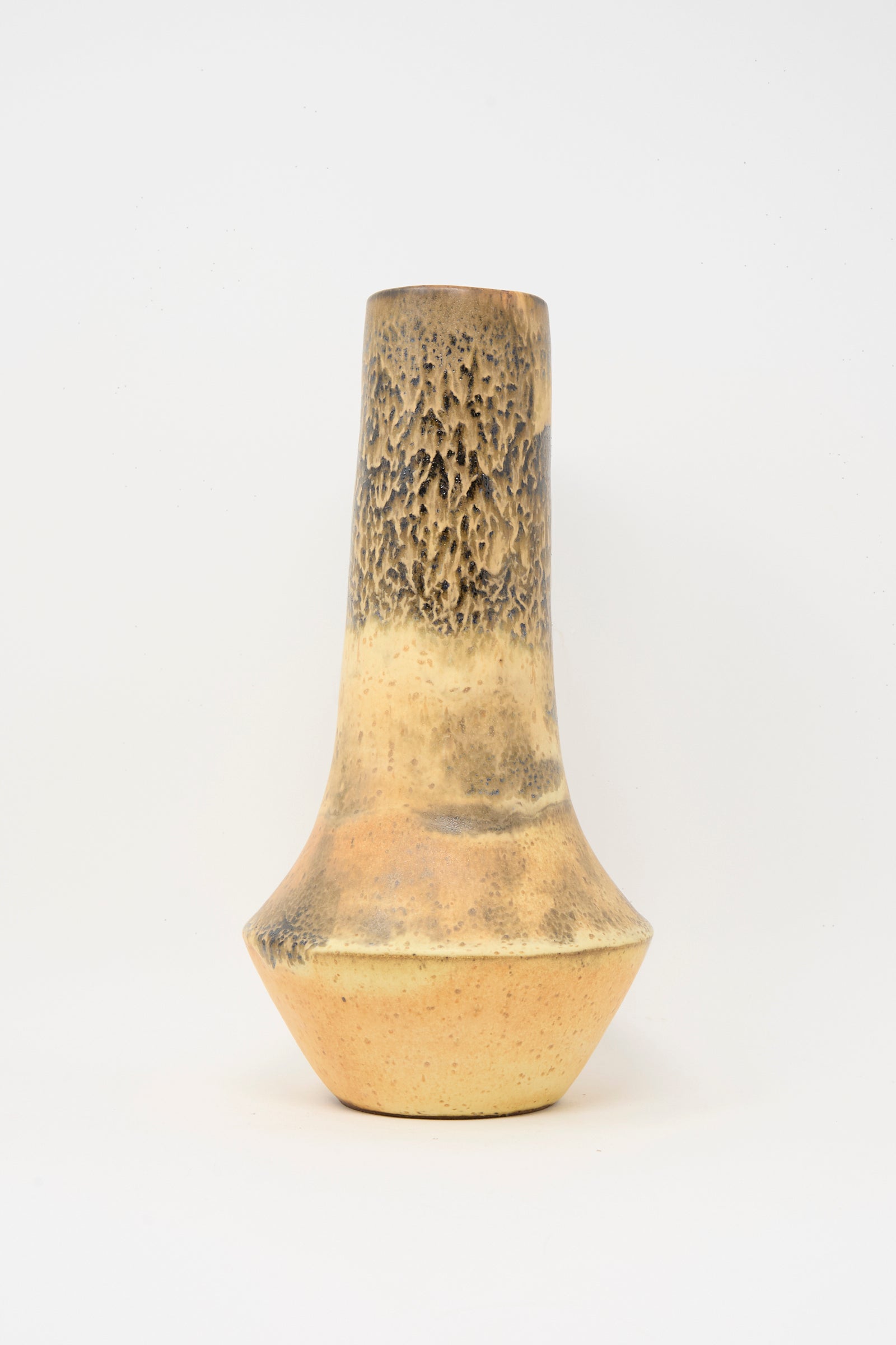 The Tall Variegated Vase in Black and Brown by Rachel Craven features a wheel-thrown design with a narrow neck, wide base, and textured surface, showcased against a plain white background.