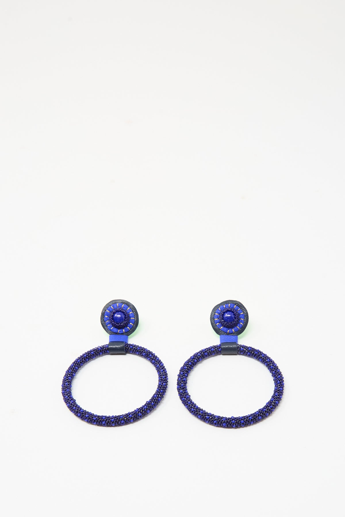 Large Beaded Hoops in Blue Lapis handmade blue beaded hoop earrings with circular posts.