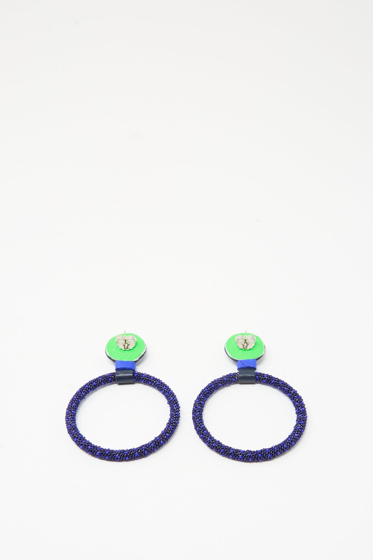 Robin Mollicone Large Beaded Hoops in Blue Lapis, featuring dark blue rings suspended from round, bright green studs.