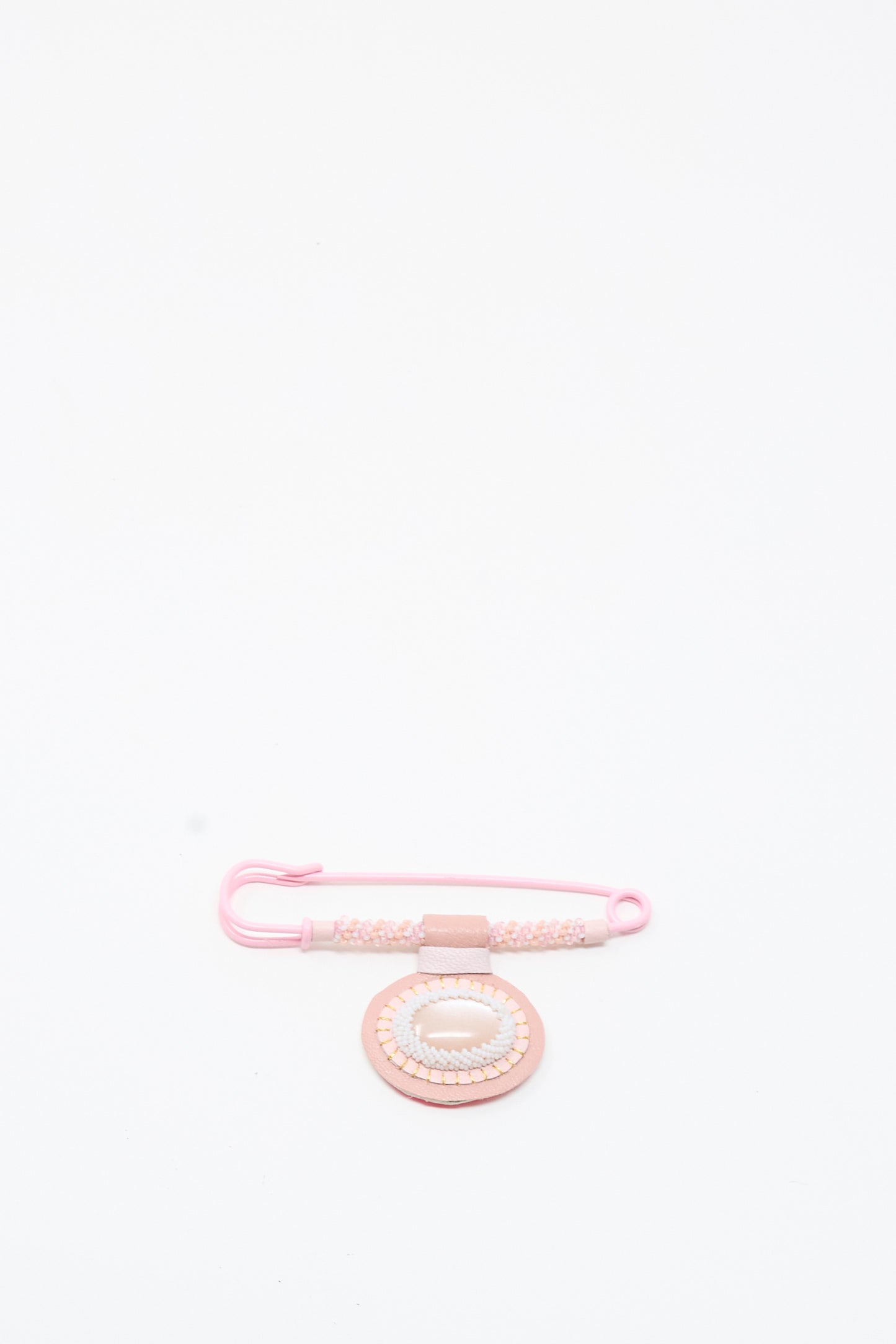 Robin Mollicone’s Moonstone Gem Drop Brooch in Pink—handmade in NYC—displayed on a plain white background.