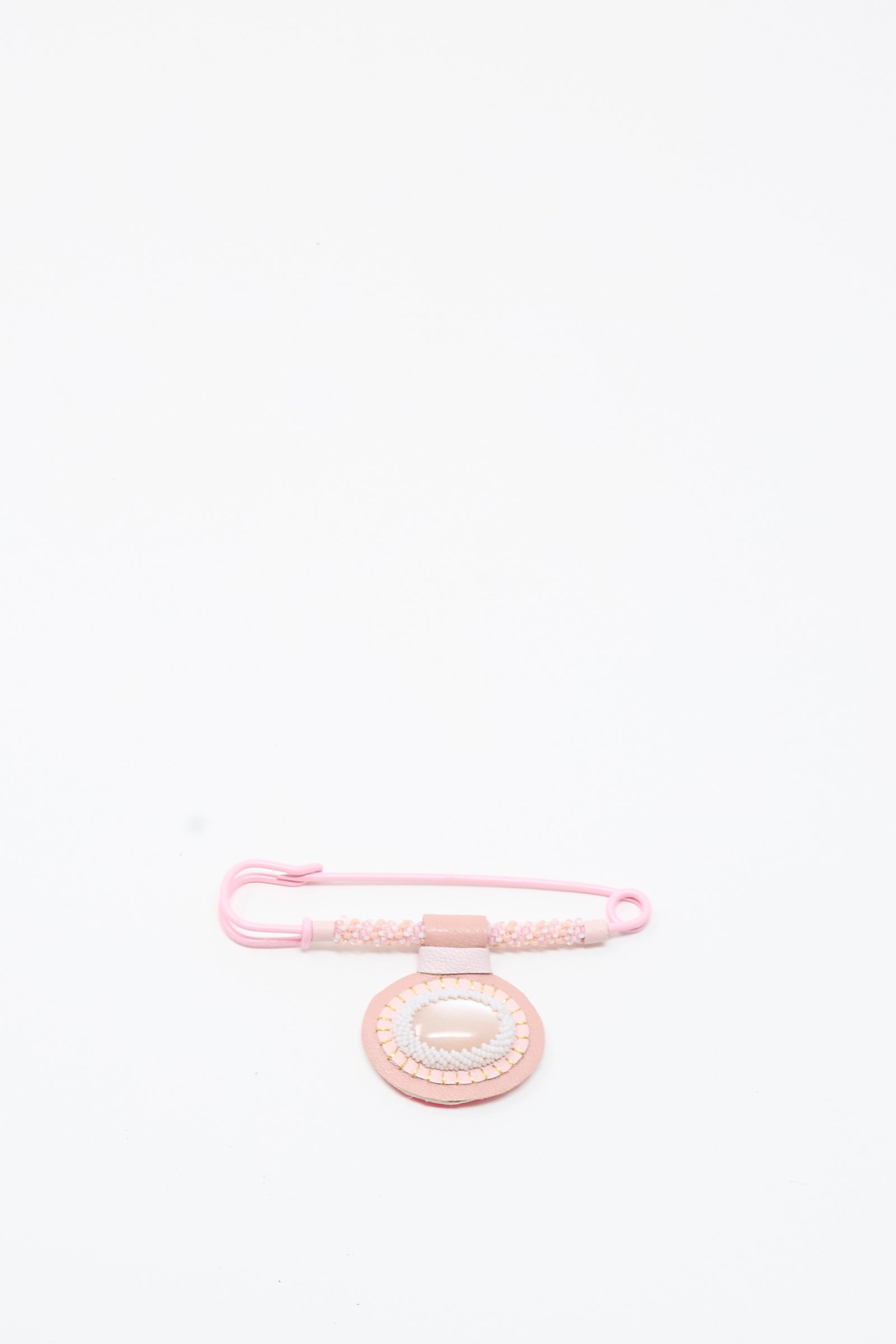 Robin Mollicone’s Moonstone Gem Drop Brooch in Pink—handmade in NYC—displayed on a plain white background.