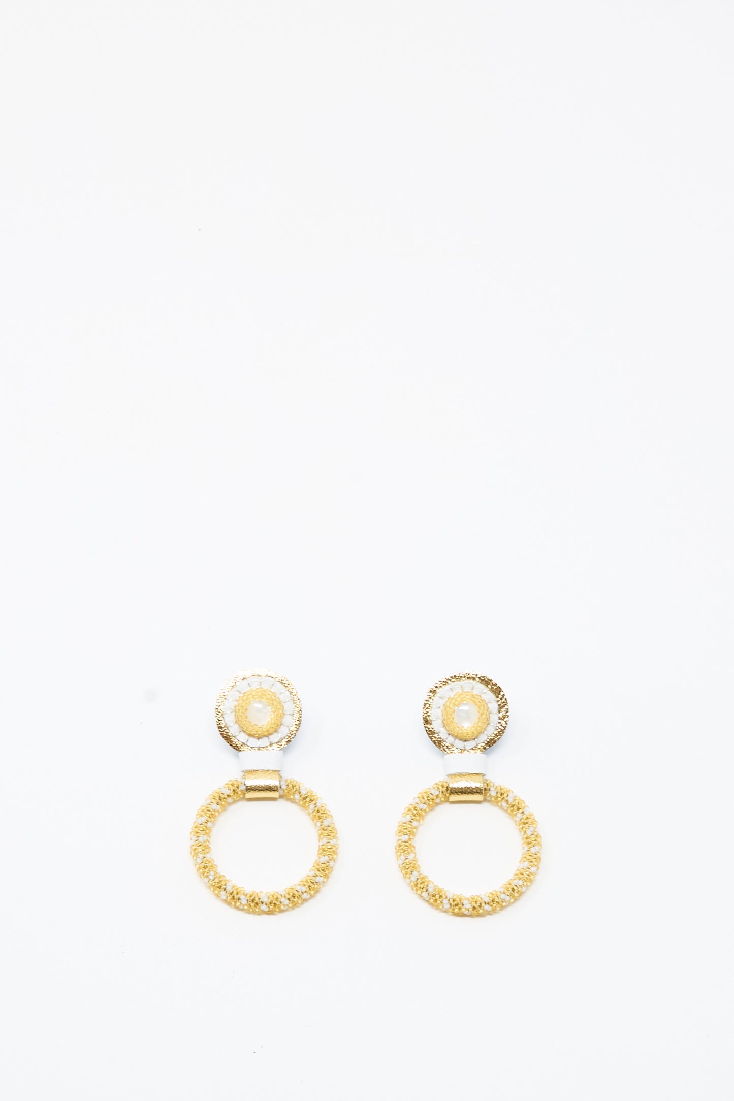 Introducing the Mother of Pearl Small Beaded Hoop Earrings in Pearl and Gold by Robin Mollicone—handcrafted hoops featuring delicate beading and lustrous details, radiating elegance against a plain white background.