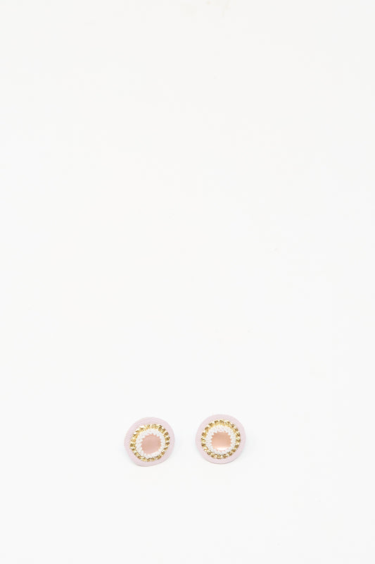 The Robin Mollicone Mother of Pearl Stud Earrings in Pink are round, gold and pink handmade studs shown on a plain white background.